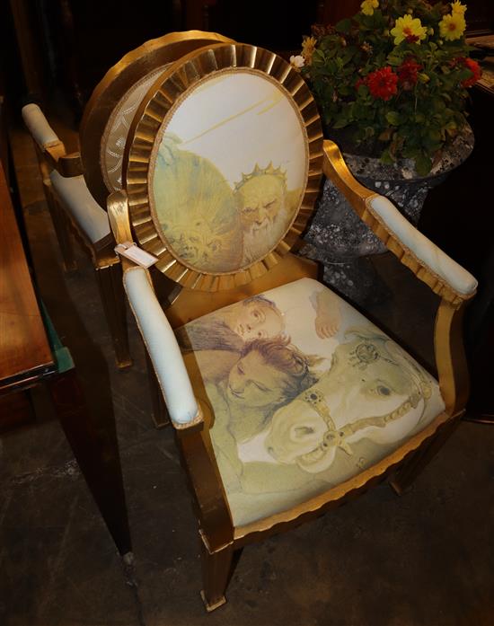 A pair of gilt French armchairs